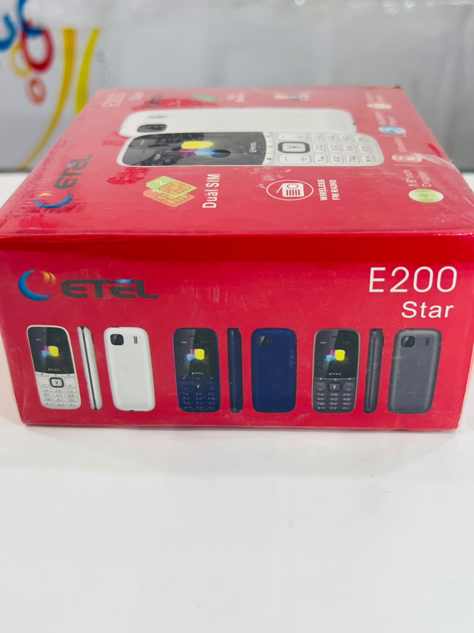 ETEL E200 Star Keypad Mobile Phone with Stylish White Finish and Easy-to-Use Design